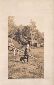 YOUNG BOY WITH PIT TYPE DOG ON FARM~1910s REAL PHOTO POSTCARD