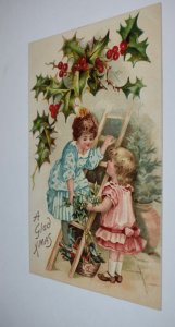 A Glad Xmas Children Ladder Holly and Berries Embossed Postcard Germany