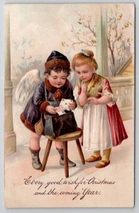 Christmas And New Year Wishes Cherub Boy With Mail For Girl PFB Postcard B45