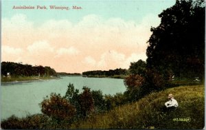 Postcard MB Winnipeg Assiniboine Park Man Sitting on the Grass ~1910 K19