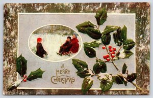 A Merry Christmas Childrens In Winter Snow And Holy Leaf Greetings Postcard