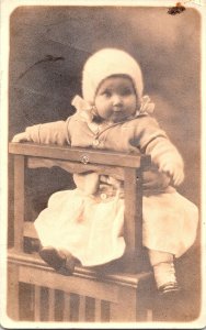 RPPC Postcard Baby Wood Chair Hat Studio Portrait c1924