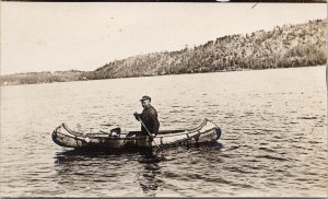 Man in Canoe Paddling Unused Real Photo Postcard F82