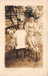 3 Kids and one on a tricycle Child, People Photo 1919 