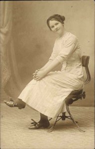 Pretty Young Woman in Studio Office Chair  B. Tarr Worcester MA RPPC c1910