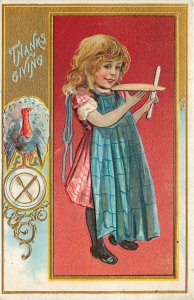 Thanksgiving Ser. 11 Postcard; Girl Child Trims Pie, Gold Details, Posted