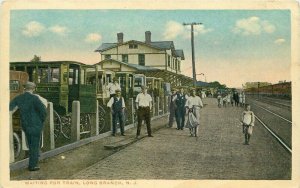 Long Branch New Jersey Waiting for Train 1920s Singers 5 & 10 Postcard 21-14452
