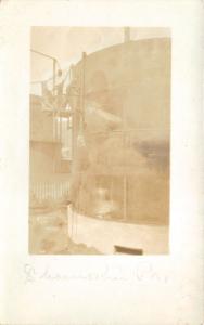 Shamokin Pennsylvania~Men on Side of Metal Grain? Bin~Farming~c1910 RPPC