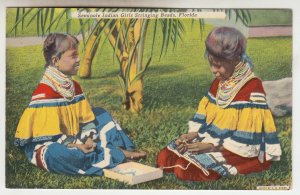 P2271, vintage postcard seminole indian girls stringing beadd florida  unused