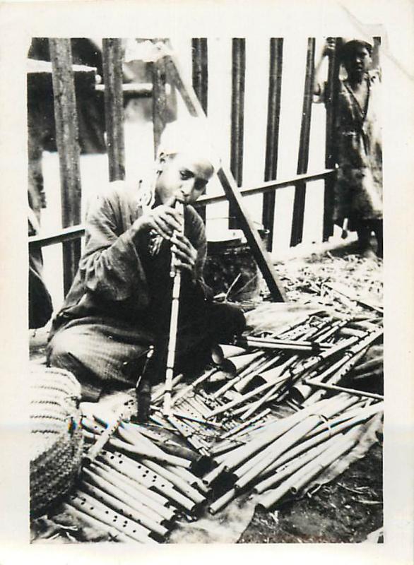 Real photo an ethnic flute maker