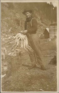 Alaska? Fishing Industry Man Holding King Crab c1910 Real Photo Postcard