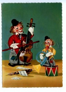 495609 East Germany GDR circus dolls clowns musicians cello Old postcard