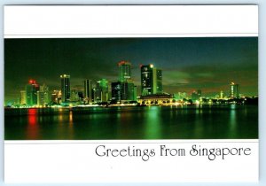 Greetings from SINGAPORE ~ Night Skyline SHENTON WAY 1988 ~ 4x6 Postcard