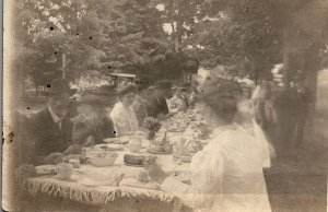 c1910 GROUP DINING AT OUTSIDE EVENT WEDDING? CHURCH? PHOTO RPPC POSTCARD 38-17