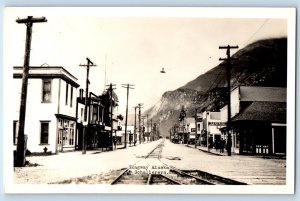 Skagway Alaska AK Postcard RPPC Photo Schallerers Jewelry Shop Theatre c1930's