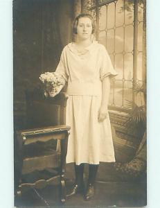 Pre-1930 rppc PRETTY GIRL HOLDING FLOWER BOUQUET r6144