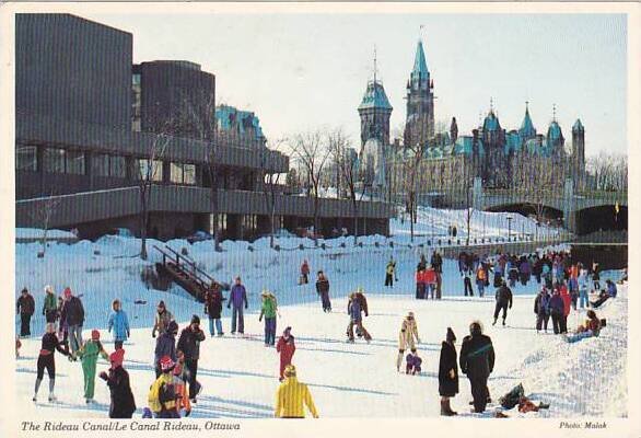 Canada Ottawa Winter Run On Rideau Canal Ice Skaters