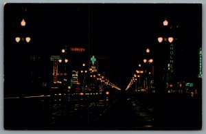 Postcard New Orleans LA c1960s Canal Street At Night Neon Signs Shops R. J. Ord