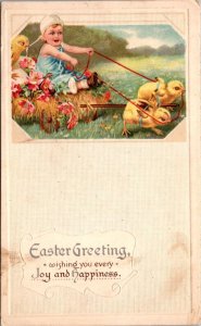 Easter Postcard Chick Pulling a Baby Toddler on Hay, Flower, Egg Covered Wagon