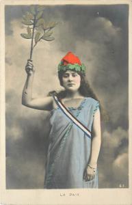 Postcard La Paix French woman holds up branch of peace wears red white blue sash