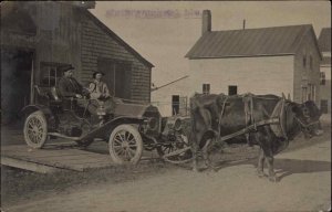 Yolked Oxed Pulling Car by Chains Mattawamkeag ME c1910 Real Photo Postcard