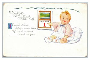 Vintage 1920's New Years Postcard - Cute Blonde Baby Points to Calendar