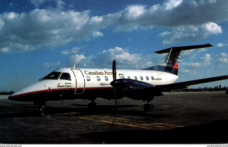 Ontario Express Embraer 120RT Brazilia At Lester B Pearson International Airp...