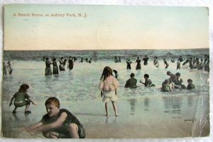 BEACH SCENE AT ASBURY PARK N.J. 1910 ANTIQUE POSTCARD