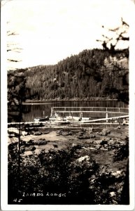 RPPC Laird's Lodge, Missoula, Montana real photo Postcard, Seeley Lake, boats