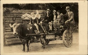 Hot Springs AR Oxen Wagon Family Log Cabin c1930 Real Photo Postcard