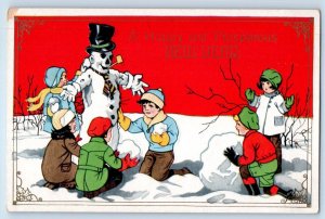 New Year Children Build Snowman With Pipe Winter Scene Embossed Postcard