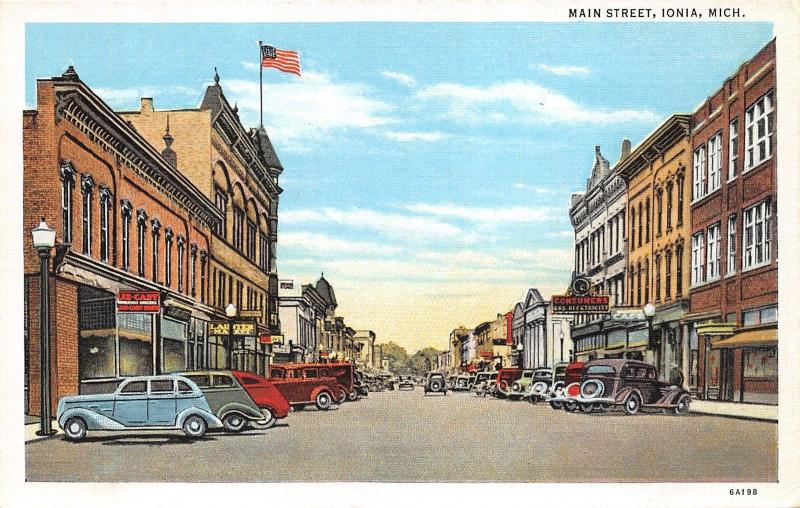 Ionia Michigan~Main Street~Storefronts~Consumers Gas & Electric~1936 Postcard