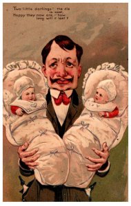 Father with Twins ,  Two little darlings ,  embossed