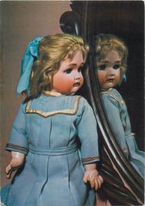 Postcard = an early Edwardian doll toy