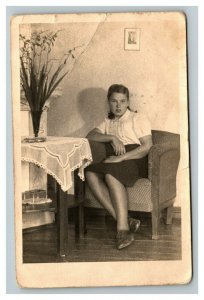 Vintage 1920's RPPC Postcard - Cute Girl in Her Livingroom Nice Flowers