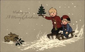Antique Christmas LITHO PC Dog Fetches Acorns Sledding Children Cute Postcard