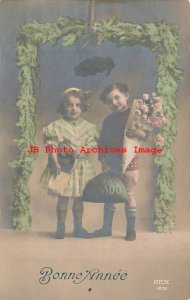 New Year, Bonne Annee, Rex No 4272, Tinted RPPC, Children with Money & Gifts