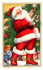 Christmas   Santa Claus  lighting candle on tree