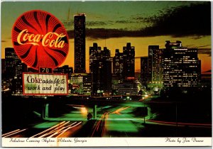 Postcard GA Atlanta Evening Skyline with large Coke sign - Coke adds life