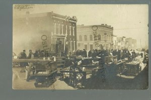 Lorain OHIO RPPC 1911 FIRE Disaster STORE BURNING Inventory in Street nr Elyria