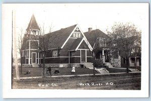 Park River North Dakota Postcard RPPC Photo Episcopal Church Dirt Road Bicycle