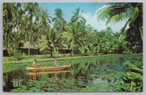 Hawaii~The Coco Palms Resort Hotel~Canoeing In Lagoon~Vintage Postcard
