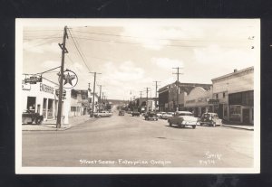 RPPC ENTERPRISE OREGON DOWNTOWN STREET SCENE OLD CARS REAL PHOTO POSTCARD