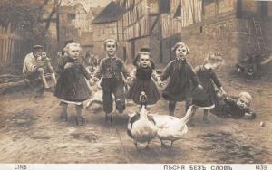 Children Chasing Geese Street Scene Real Photo Antique Postcard J66573