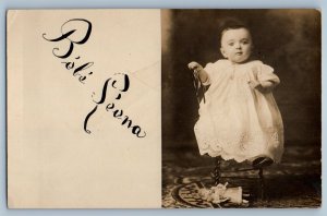 c1910's Cute Baby Girl Sitting On Chair Doll Studio RPPC Photo Antique Postcard