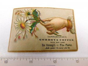 1880's-90's Dannemiller's Cordova Coffee Ladies Hand Daisies Trade Card F29