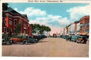 Independence, Missouri - Cars parked Downtown on Main Street - c1920