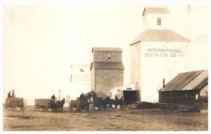 102  Saskatchewan Ogema   International Elevator Co. Wagons  Hauling Grain RPC