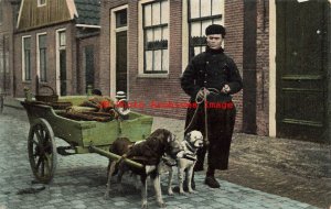 Netherlands, Volendam, Man with His Dog Drawn Cart