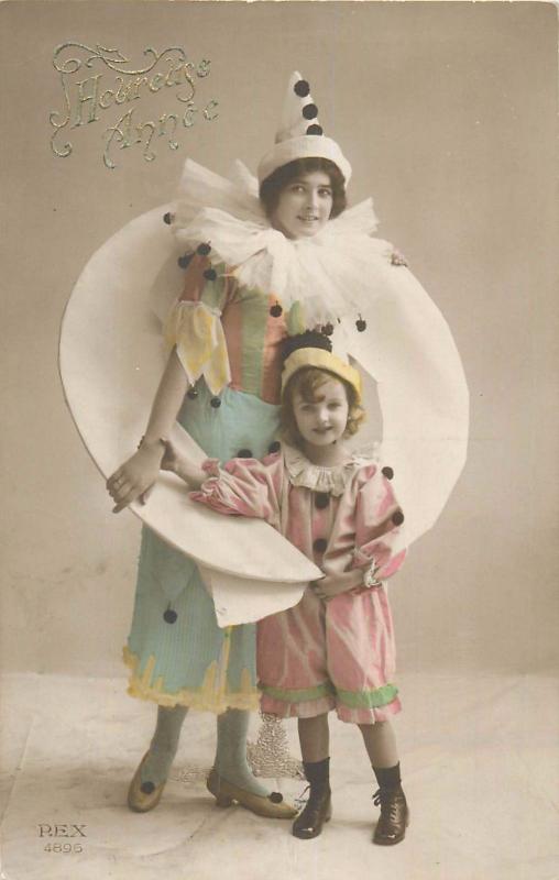 Charming young lady & girl harlequin costumes vintage tinted postcard